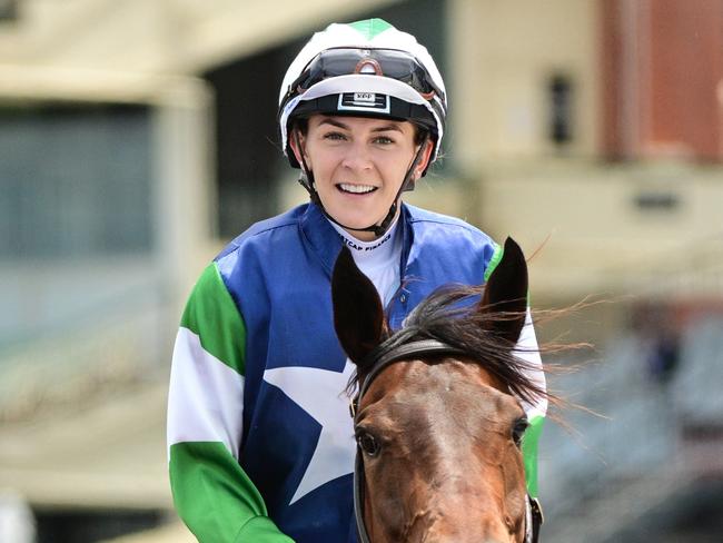 MELBOURNE, AUSTRALIA - NOVEMBER 20: Celine Gaudray riding Over The Stars after winning Race 2, the Senet Gambling Law Experts Plate during Melbourne Racing at Caulfield Racecourse on November 20, 2024 in Melbourne, Australia. (Photo by Vince Caligiuri/Getty Images)