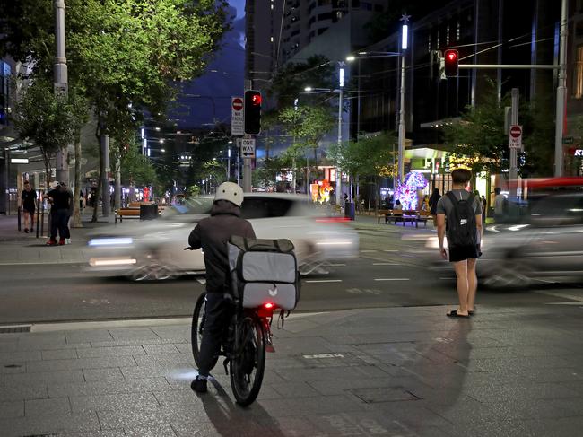 DAILY TELEGRAPH - 7 FEBRUARY, 2022. Various locations around Sydney CBD on a Monday evening as Sydney looks to reopen international borders to visitors and tourists. George St looking south from Bathurst St at 8:22pm. Picture: Toby Zerna