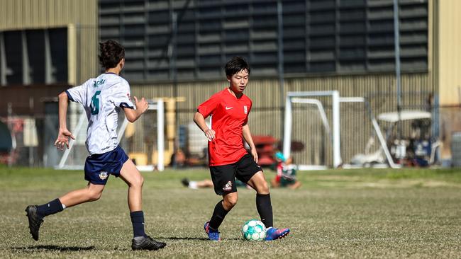 Kelvin Grove State College's Dohyup Lee on the move.