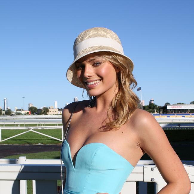 Margot Robbie enjoy the Caulfield Cup at the Gold Coast Turf Club in the Dome on Saturday, October 16, 2010. Photo: Katrina Jones.