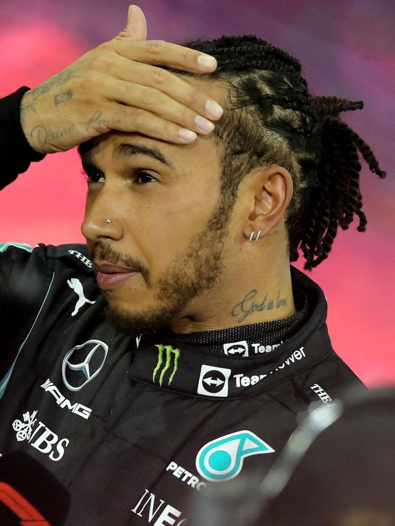 Hamilton wasn’t happy. (Photo by KAMRAN JEBREILI / POOL / AFP)