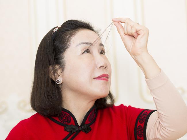 Can she make a ponytail with her eyelashes? Picture: Jonathan Browning/Guinness World Records