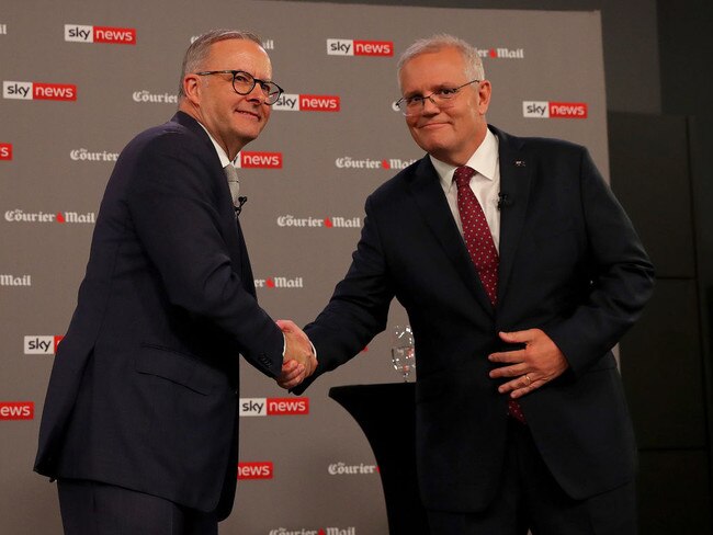 Leader of the Opposition Anthony Albanese and Australian Prime Minister Scott Morrison attend the first leaders' debate of the 2022 federal election campaign at the Gabba on April 20.