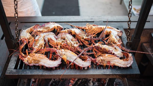 Lobsters on the grill at Pirate Life, Port Adelaide. Picture: DUYDASH