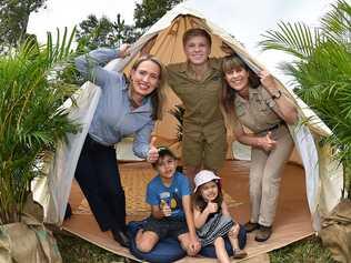 Australia Zoo has partnered with the State Government to expand their tourism offering on the Sunshine Coast. Tourism Industry Development Minister Kate Jones, Tom and Grace Cronin with Robert and Terri Irwin. Photo: Patrick Woods