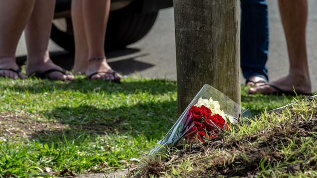 Flowers and a note were left by friends who were shocked by the death. Picture: Monique Harmer