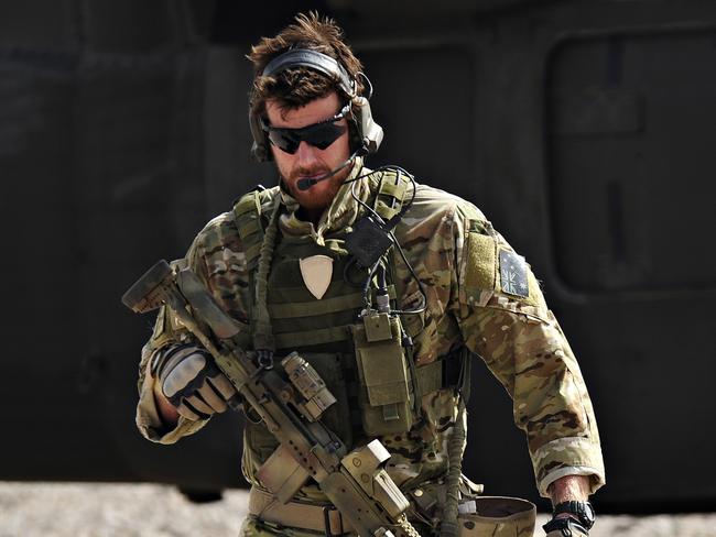 Australian Army soldier Corporal Benjamin Roberts-Smith, VC, MG, with the Special Operations Task Group, moves away from a United States UH-60 Black Hawk helicopter during preparations for the Shah Wali Kot Offensive in southern Afghanistan. *** Local Caption *** In June 2010, Afghan National Security Forces (ANSF) partnered with Australian special forces from the Special Operations Task Group to conduct a deliberate operation to clear a Taliban insurgent stronghold in the Shah Wali Kot region of northern Kandahar province.  The Shah Wali Kot Offensive comprised synchronised and deliberate clearance operations involving Australian commandos combined with a number of surgical helicopter-born assaults from Special Air Service (SAS) troops on key targets.  Removing Taliban insurgents from Afghan communities allows the Government of Afghanistan to establish a presence and gain the trust of the community to provide them with necessary infrastructure and security that was not provided by the insurgents.  The Shah Wali Kot Offensive was part of Australiaâs contribution to Operation Hamkari, an ISAF operation to extend the Government of Afghanistanâs influence into Kandahar City in southern Afghanistan. Picture: Department of Defence