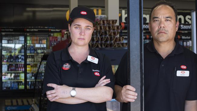 Owners Shelly and Kenny Lay standing in front of their Zuccoli Celebrations bottle shop. Picture: Floss Adams