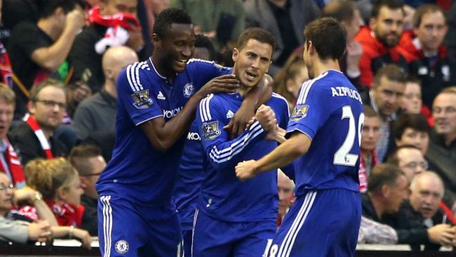 Chelsea's Eden Hazard, center, celebrates scoring his side's first goal.