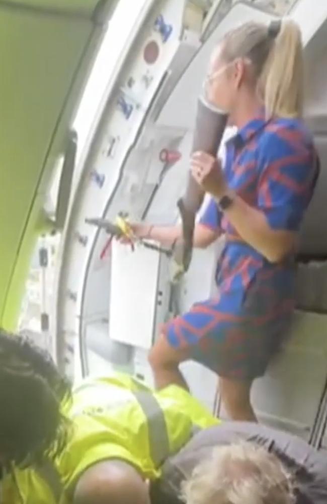 A Jetstar crew member with half of the shotgun. Picture: 9News