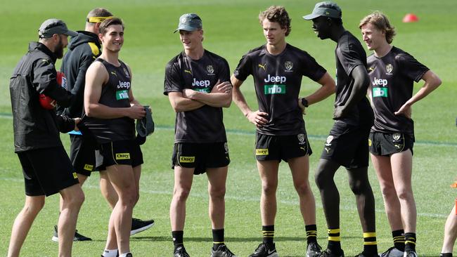 Development coach Ryan Ferguson talks with draftees Will Martyn, Noah Cumberland, Thomson Dow, Bigoa Nyuon and Hugo Ralphsmith. Picture: Michael Klein