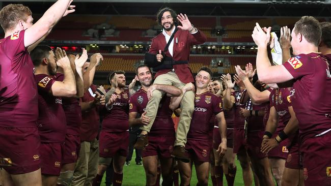 Johnathan Thurston is chaired off. Picture: Brett Costello