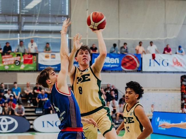 Jacob Furphy goes to work on Serbia in the gold-medal game at the Albert Schweitzer game in Germany.