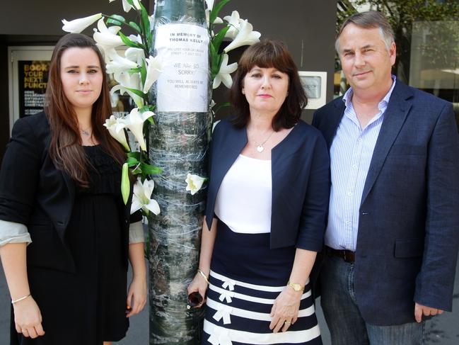 Ralph and Kathy Kelly along with daughter Maddy during one of their visits to Thomas’ memorial in 2014. 