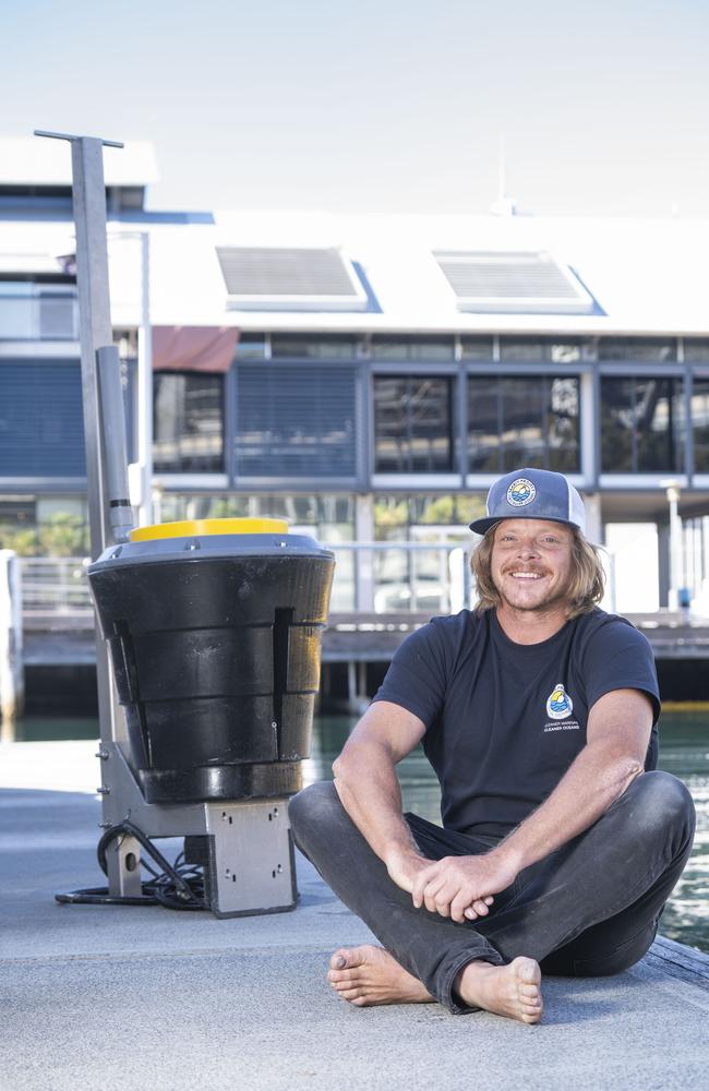 Seabin CEO and co-founder Pete Ceglinski with the seabin to be installed in Pyrmont as part of a bid to reduce the amount of plastic going into Sydney Harbour. Picture: AAP / Image Matthew Vasilescu