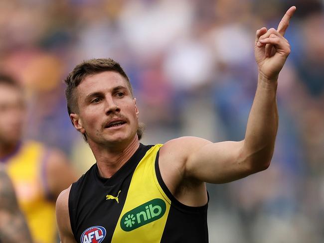 PERTH, AUSTRALIA – APRIL 14: Liam Baker of the Tigers celebrates after scoring a goal during the 2024 AFL Round 05 match between the West Coast Eagles and the Richmond Tigers at Optus Stadium on April 14, 2024 in Perth, Australia. (Photo by Will Russell/AFL Photos via Getty Images)