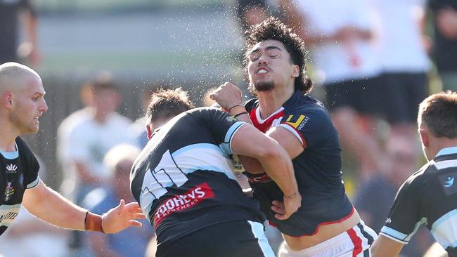 Erina’s Marlon Guest taking a big hit-up. Picture: Sue Graham