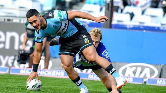 Valentine Holmes scores a try for the Sharks. Picture: AAP