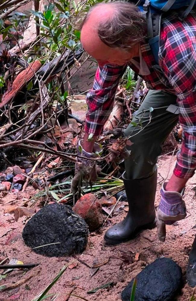 The group found chunks of coal, fine particles and a black river. Picture: Supplied