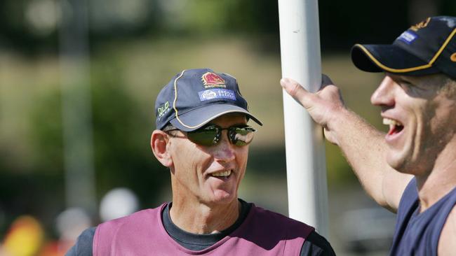 Thorn and Bennett share a joke at Broncos training.