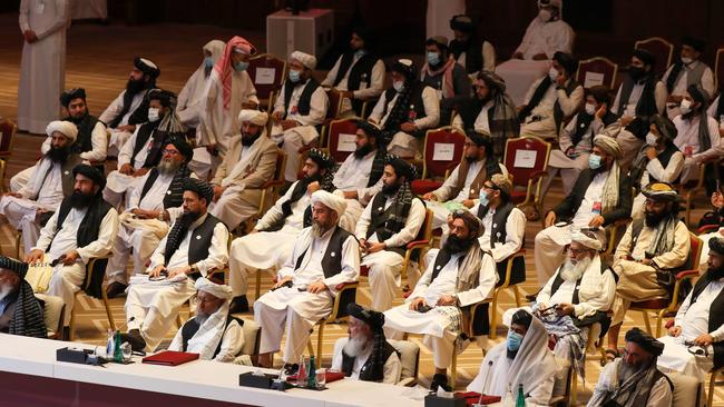 Members of the Taliban delegation attend the opening session of the peace talks between the Afghan government and the Taliban in the Qatari capital Doha on September 12. Picture: AFP