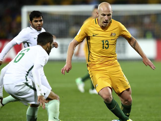 SOCCER - Socceroos v Saudi Arabia - World Cup qualifier at Adelaide Oval. Aaron Mooy and Mohammed Ibrahim Alburayk. Picture Sarah Reed.