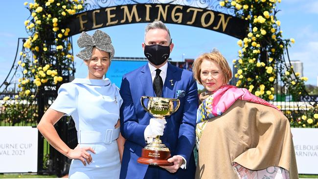 Trainer Gai Waterhouse, Victoria Racing Club Chairman Neil Wilson and Melbourne Cup Carnival Ambassador Michelle Payne pose with the Melbourne Cup. Photo by Quinn Rooney/Getty Images)