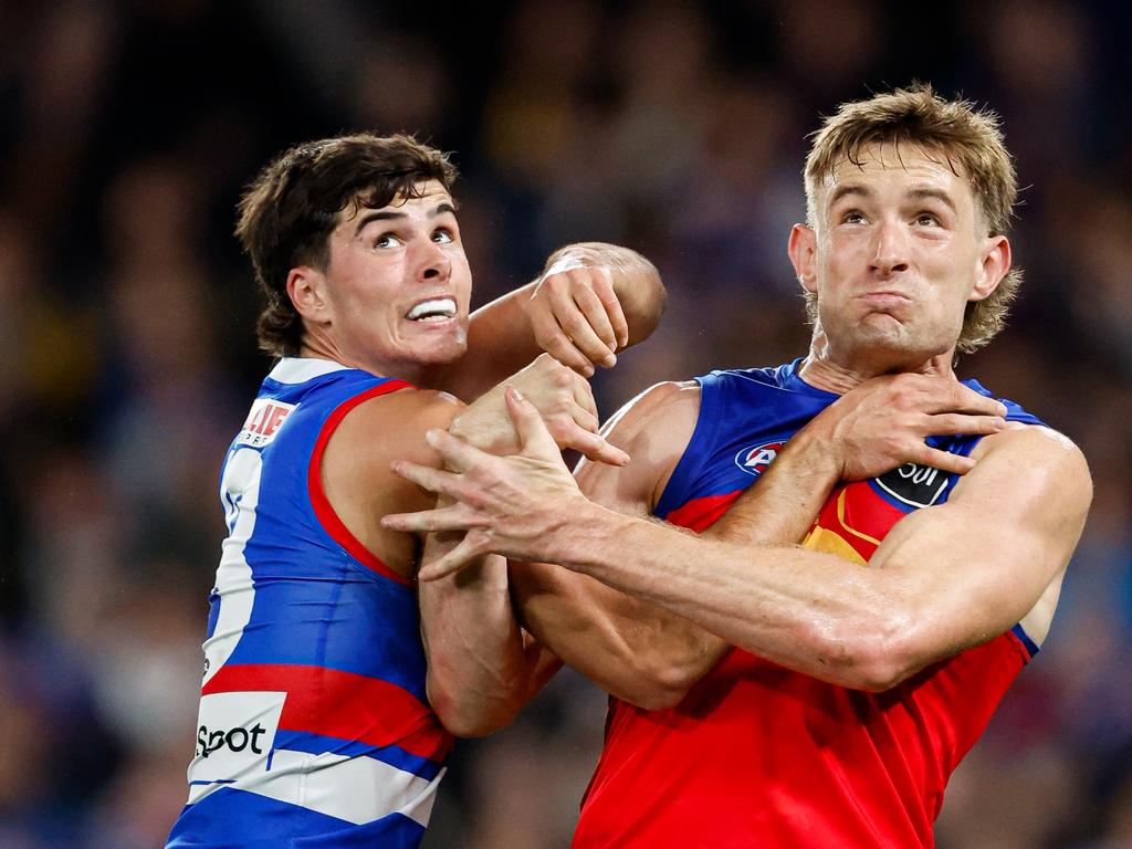 James O’Donnell jostles for position with Harris Andrews. Picture: Dylan Burns/AFL Photos via Getty Images