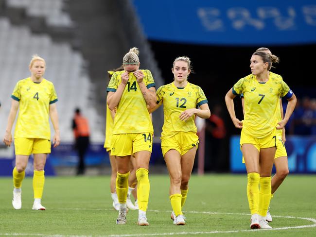 MARSEILLE, FRANCE - JULY 31: Alanna Kennedy #14 of Team Australia shows her dejection after losing the Women's group B match between Australia and United States during the Olympic Games Paris 2024 at Stade de Marseille on July 31, 2024 in Marseille, France. (Photo by Alex Livesey/Getty Images)