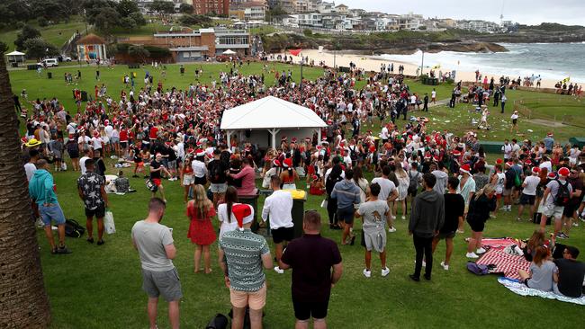 Bronte Beach was mostly empty as hundred of backpackers took to a grass patch nearby. Picture: Toby Zerna