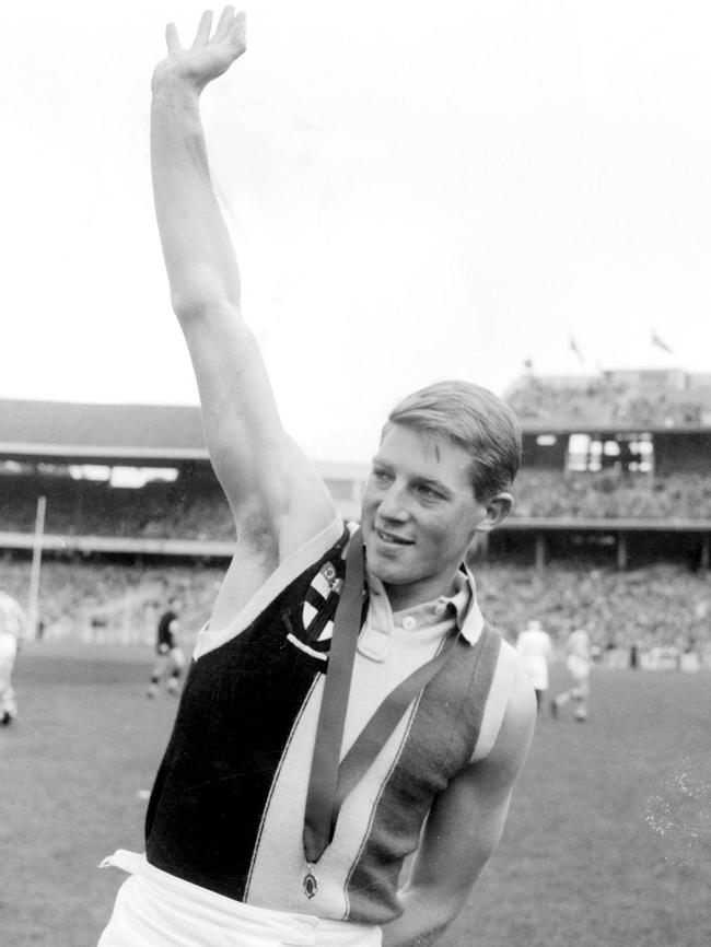 Neil Roberts celebrates after receiving his Brownlow Medal at the MCG.