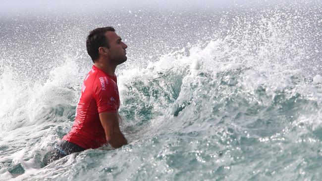 Joel Parkinson looks for a good wave at Snapper Rocks yesterday. Picture: Regi Varghese