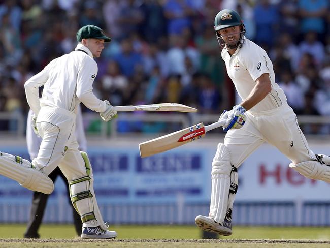 Shaun Marsh and Peter Handscomb batted for almost 60 overs to dig the Aussies out of a hole.