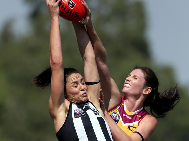 Sharni Layton stretches to take a mark. Picture: AAP