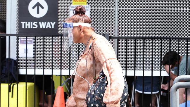 A woman waits to be tested at the Cairns Hospital Covid and fever testing clinic. Picture: Brendan Radke