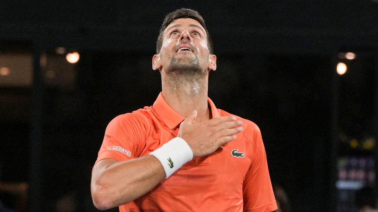 TOPSHOT - Serbia's Novak Djokovic celebrates beating Canada's Denis Shapovalov in their men's singles quarter-final match at the Adelaide International tennis tournament in Adelaide on January 6, 2023. (Photo by Brenton EDWARDS / AFP) / - IMAGE RESTRICTED TO EDITORIAL USE - STRICTLY NO COMMERCIAL USE-