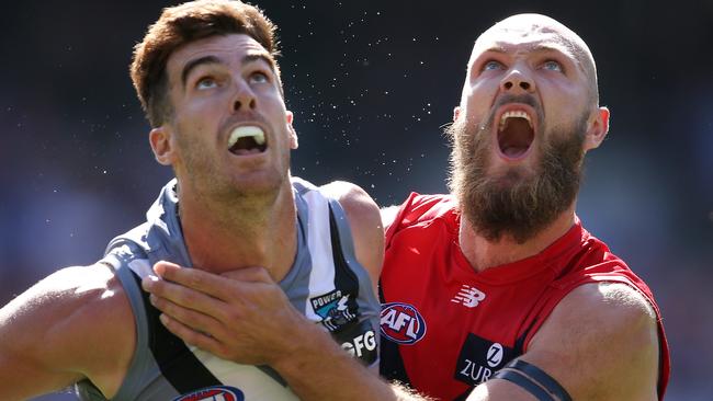 Max Gawn of the Demons and Scott Lycett of the Power battle. Picture: Michael Klein.