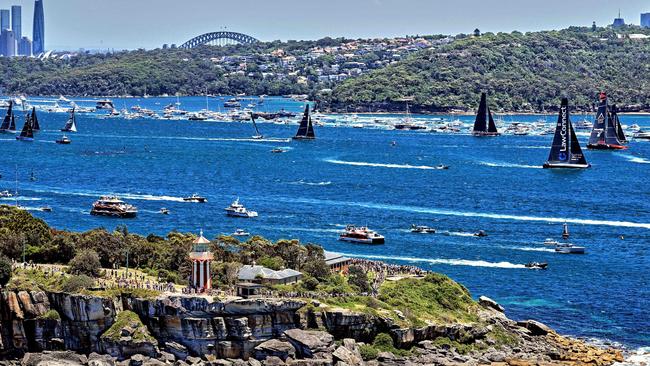 This handout image taken and received from Rolex on December 26, 2024 shows yachts competing at the start of the annual Sydney to Hobart yacht race on Boxing Day on Sydney Harbour. (Photo by Carlo Borlenghi / ROLEX / AFP) / RESTRICTED TO EDITORIAL USE -