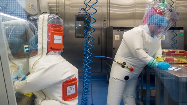 Workers inside the P4 laboratory in Wuhan, which is at the heart of coronavirus conspiracy theories. Picture: AFP