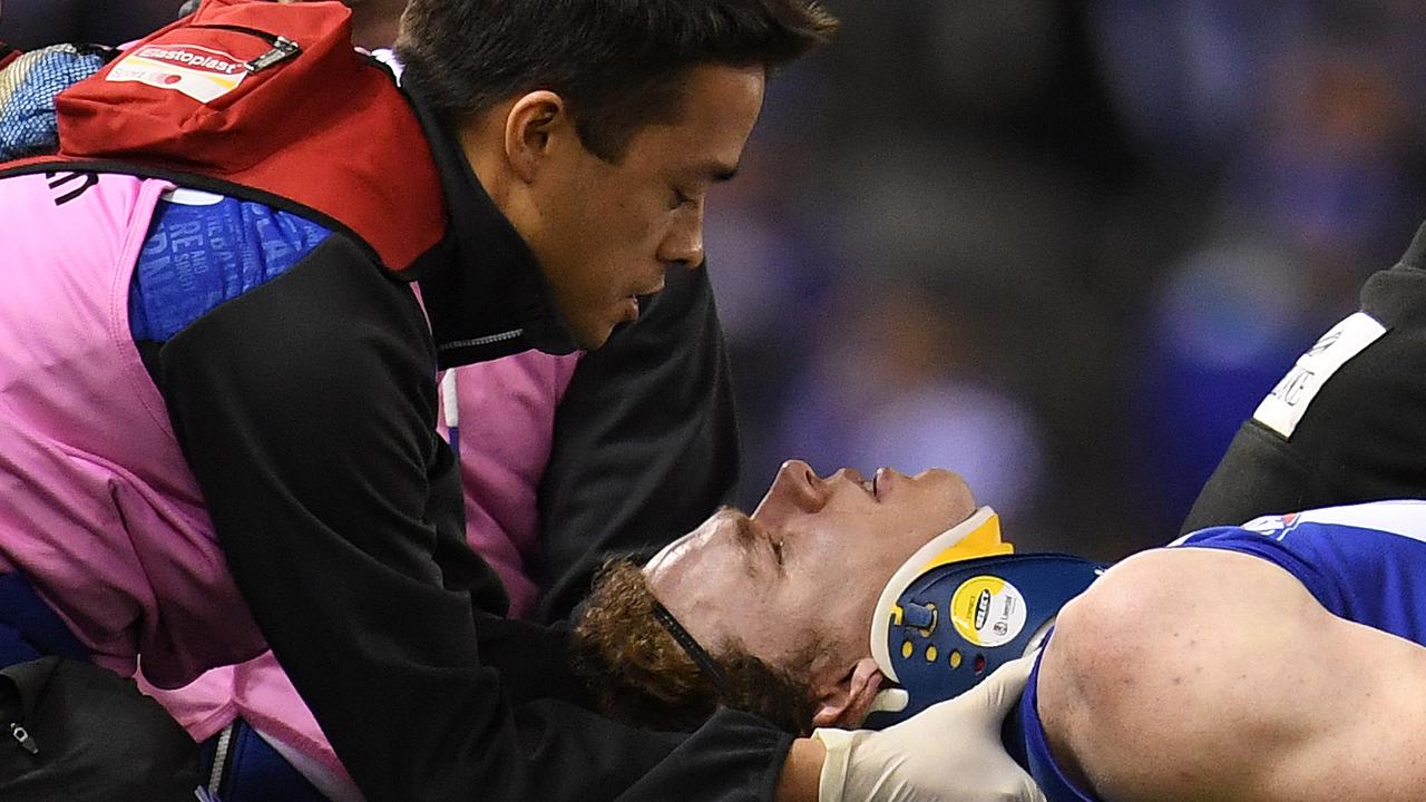 Ben Brown is treated for concussion after being knocked out at Etihad Stadium in 2007.