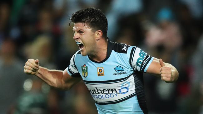 Chad Townsend scores a try against the Cowboys. Picture. Brett Costello