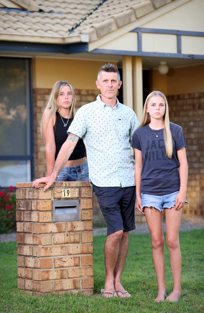 Lee Lovell with daughters Scarlett and Kassie at home in North Lakes. Picture: Steve Pohlner