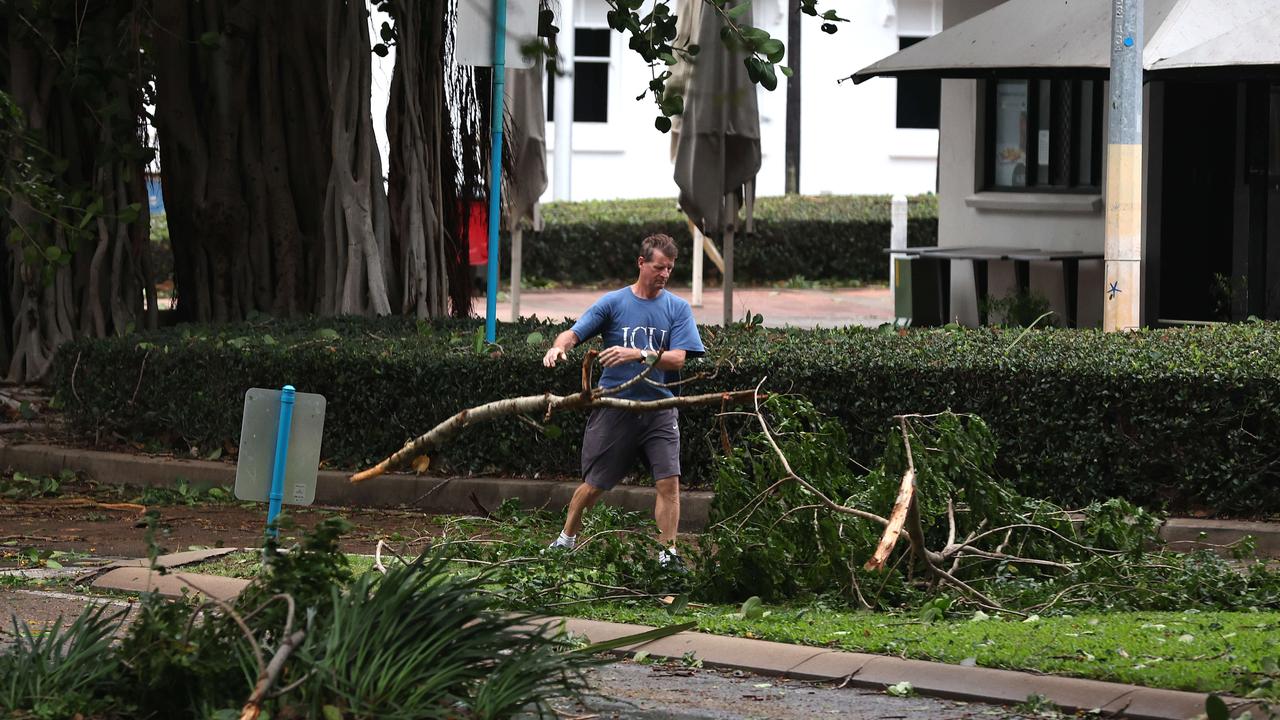 Townsville locals woke early to inspect the damage along The Strand left from TC Kirrily that hit overnight. Picture: Adam Head