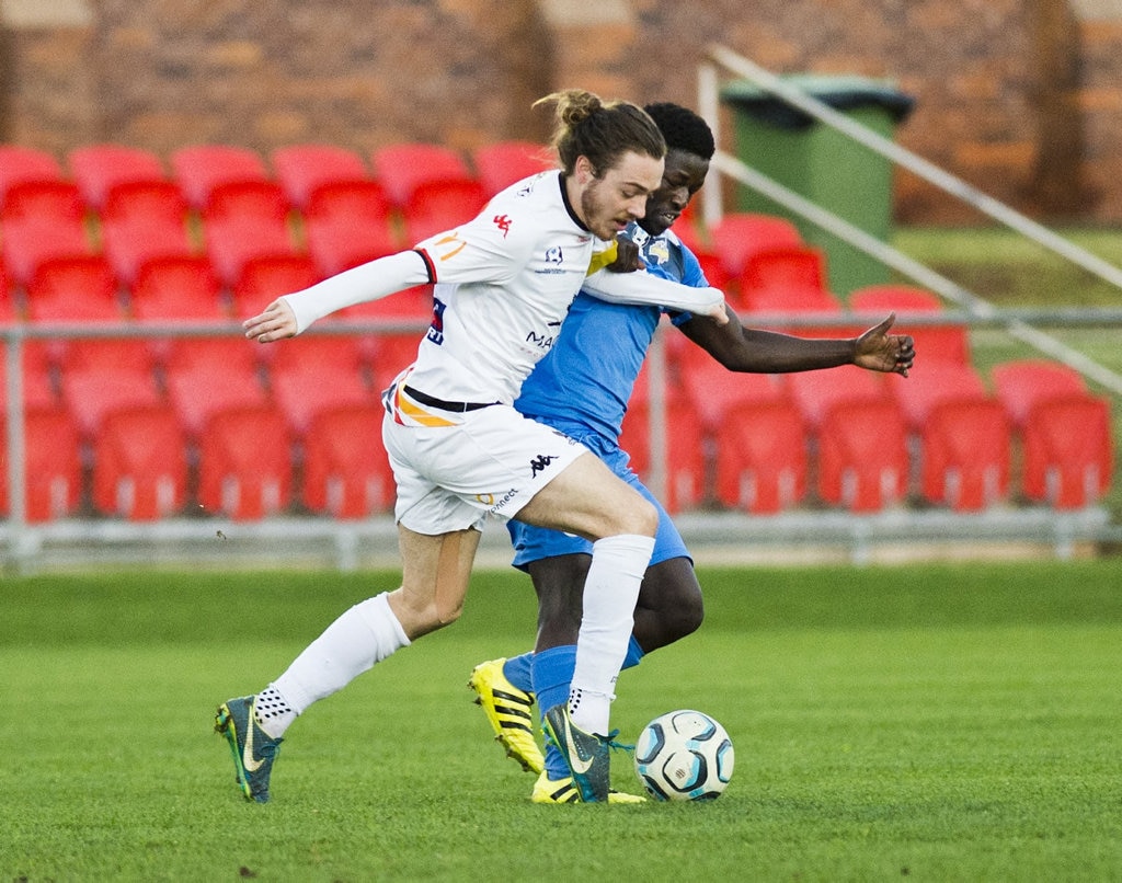 Lewis Farquhar, Magpies and Emmanuel Philip, Thunder. Picture: Nev Madsen