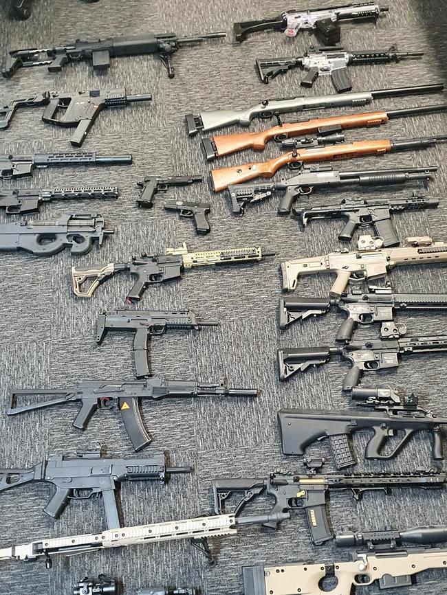 Dozens of outlawed gel blasters seized from a Mawson Lakes home on Friday. Picture: SA Police