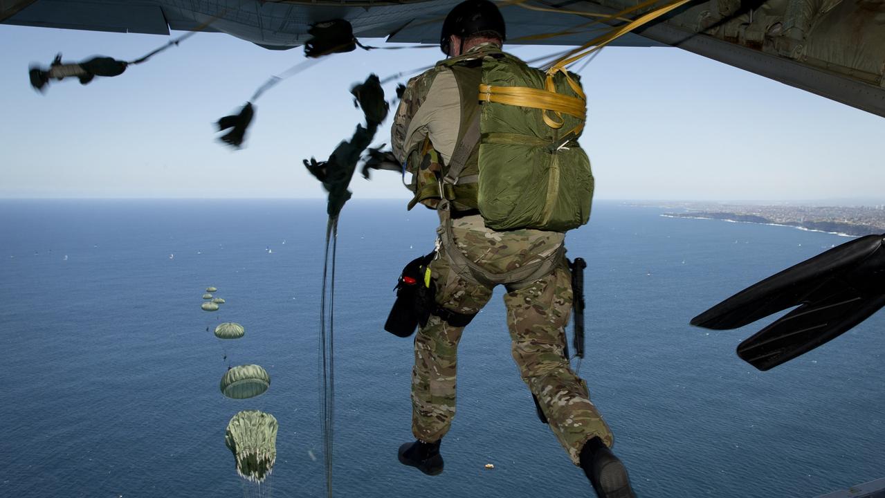 An Australian Army soldier from 1st Commando Regiment jumps from a RAAF C-130J off the Sydney coast. Picture: Defence