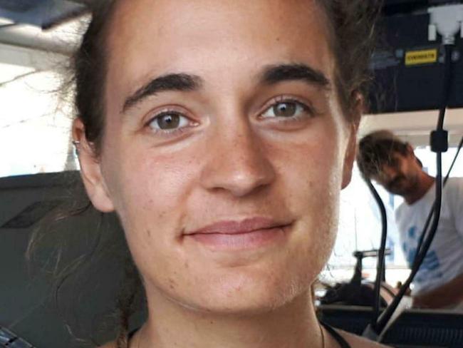 Sea-Watch 3 captain Carola Rackete is seen on board the vessel at sea in the Mediterranean, just off the coasts of the southern Italian island of Lampedusa, Thursday, June 27, 2019. The captain of the humanitarian rescue ship says that Italian law enforcement officials have told them that a resolution is near for 42 migrants rescued at sea that Italyâ€™s populist government has so far refused to allow to disembark. (ANSA/Matteo Guidelli via AP)