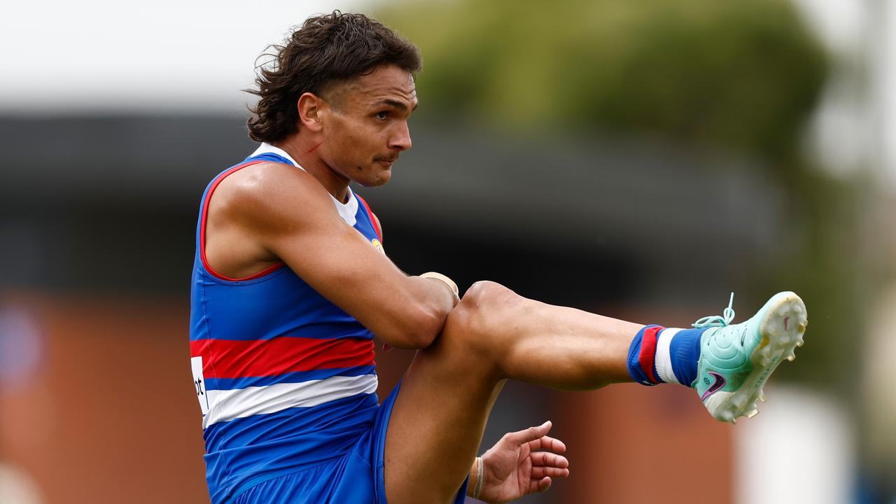 MELBOURNE, AUSTRALIA - FEBRUARY 23: Jamarra Ugle-Hagan of the Bulldogs kicks the ball during the AFL 2024 Match Simulation between the Western Bulldogs and Hawthorn at Whitten Oval on February 23, 2024 in Melbourne, Australia. (Photo by Michael Willson/AFL Photos via Getty Images)