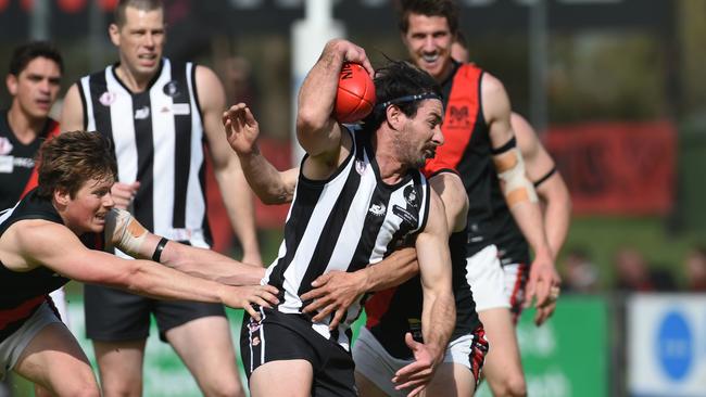 Reynella and Morphett Vale clash in the 2022 SFL grand final. Picture: Tricia Watkinson