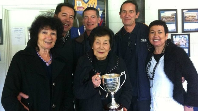 Members of the Parker family with the cup in 2013. Second-right is Rob Parker. Picture: Heathmont FNC